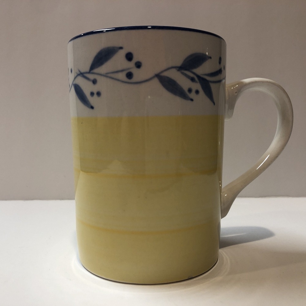Tabletops Unlimited CELESTINO Light Yellow Coffee Mug Blue Buds Leaves on Vine‎